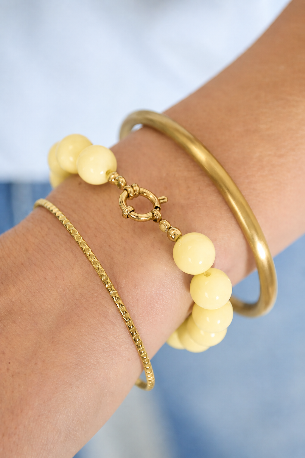 Kralenarmband zacht geel K000